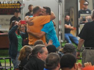 Grand championship hug at the New Holland Summerfest competition