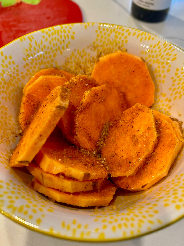 Season sweet potato slices with Pineapple Head seasoning