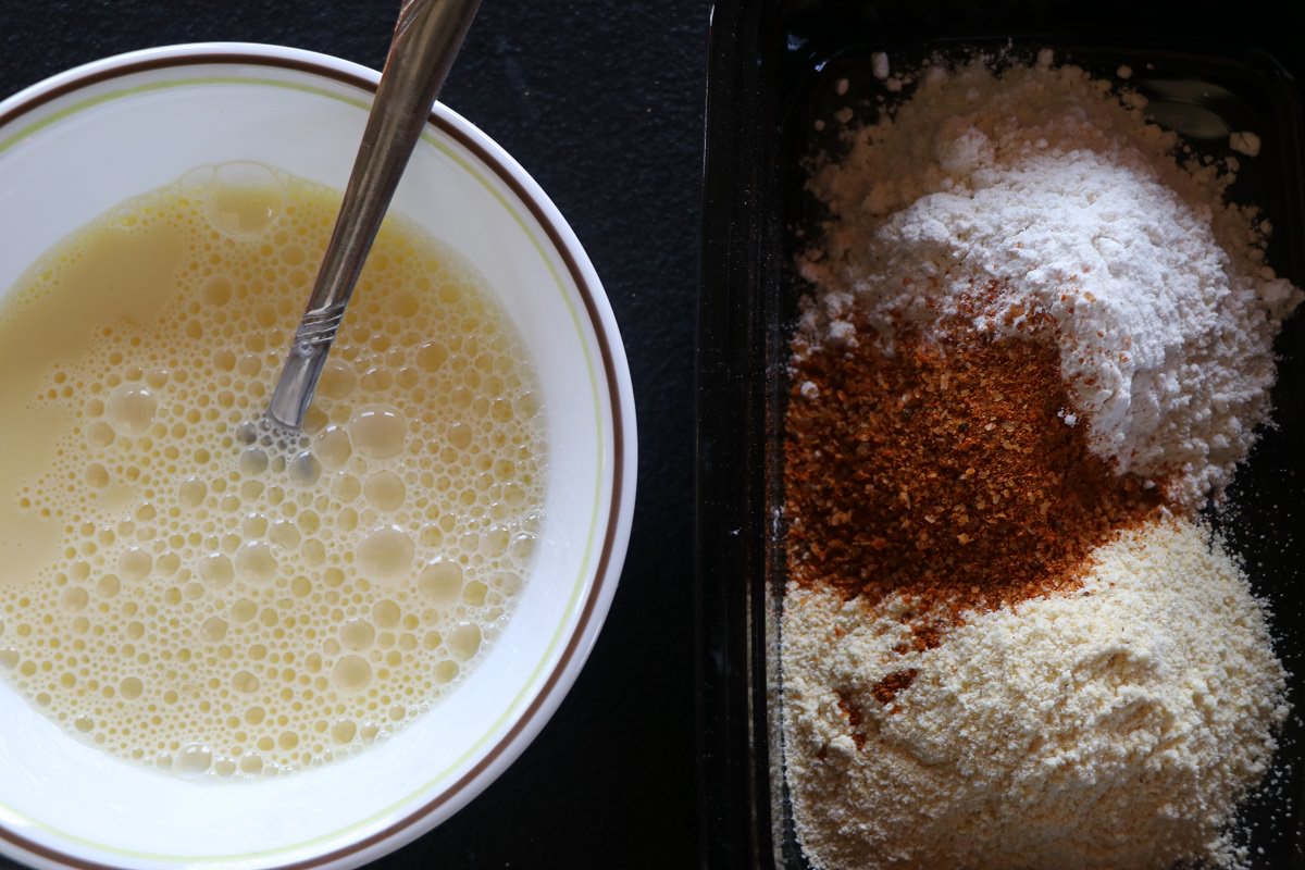 Prepare egg wash and flour mixture