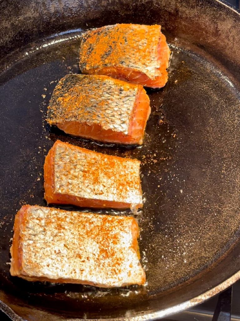 Seal salmon flesh side down