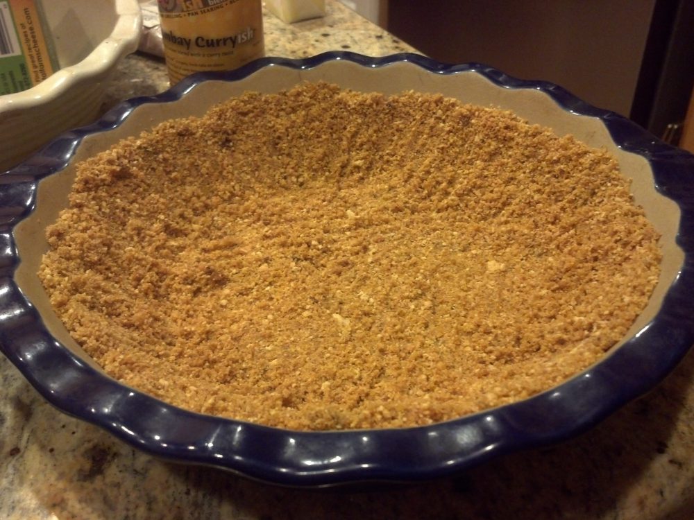 Spread crumbs evenly around pie pan