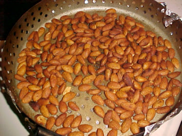 Almonds roasting on grill