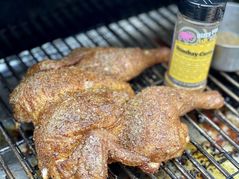 Spatchcock chicken rubbed with Dizzy Pig Bombay Curry-ish