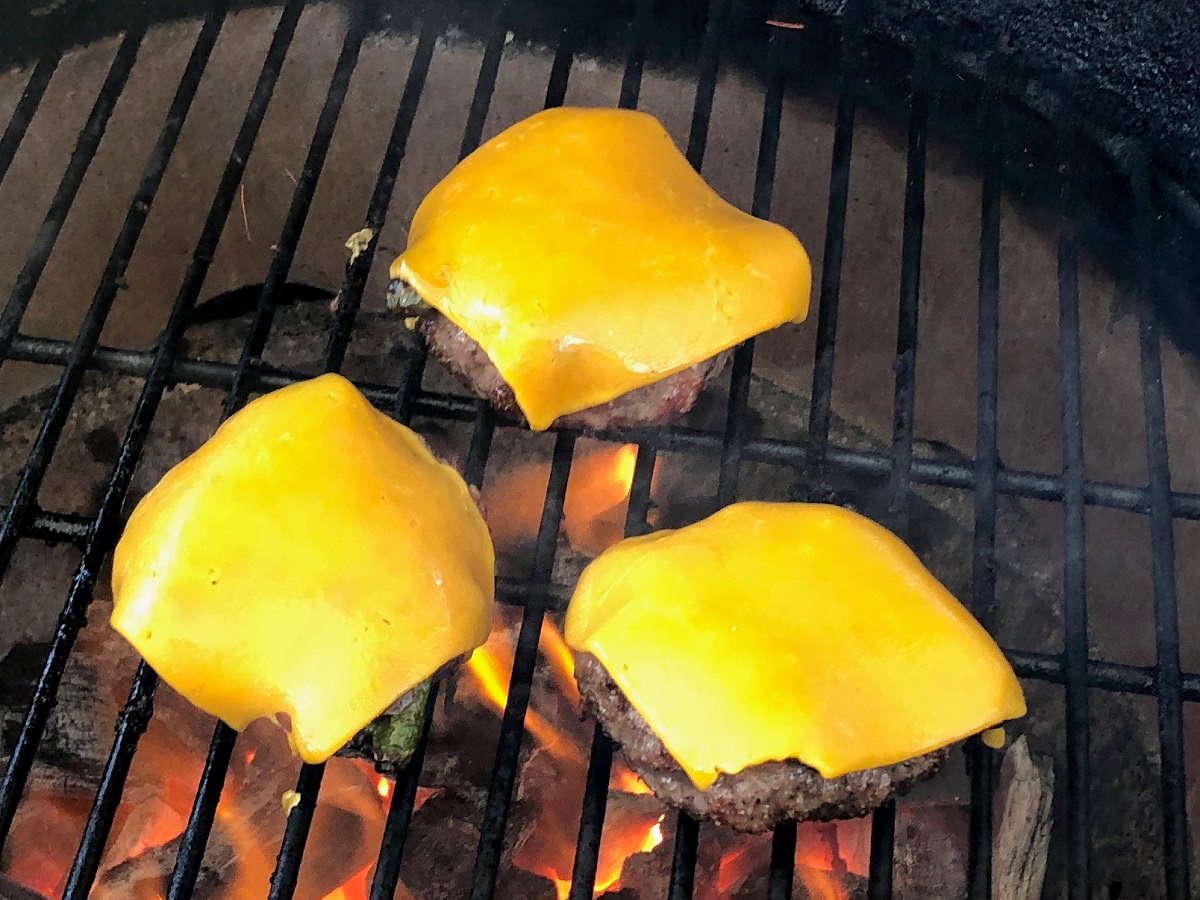 burgers cooked until the cheese is melted