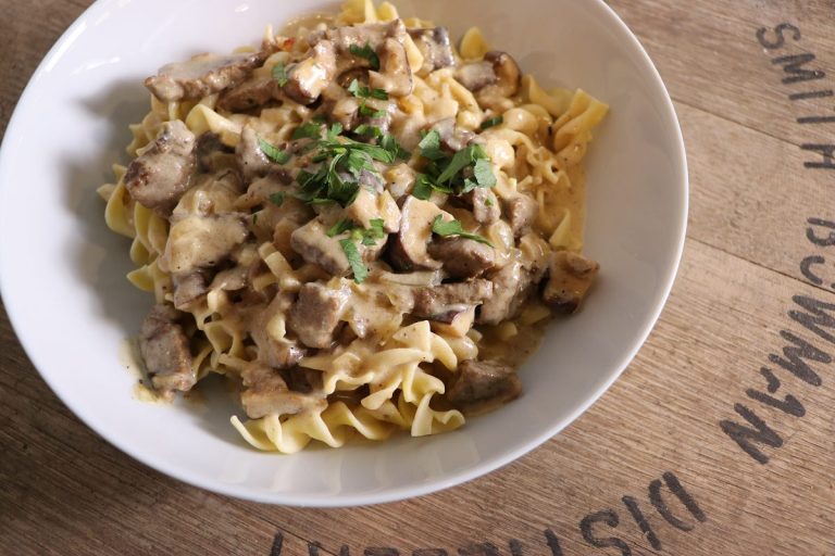 Serve stroganoff over wide egg noodles