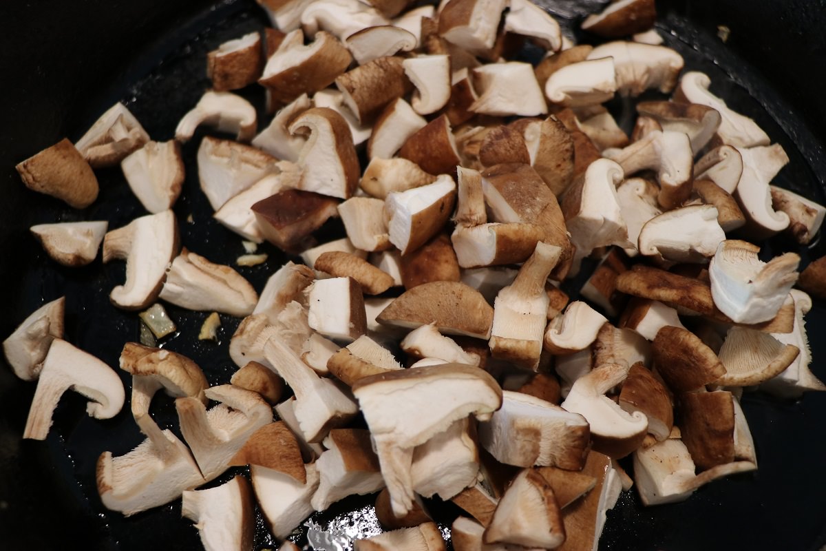 Sauté the mushrooms in a medium hot pan