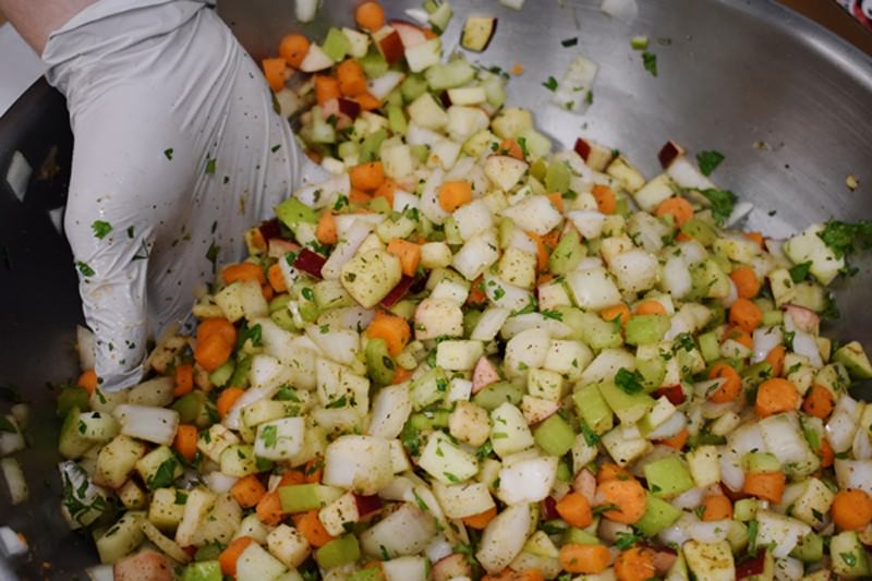 Combine chopped herbs, vegetables, apples, salt, and Mediterranean-ish seasoning