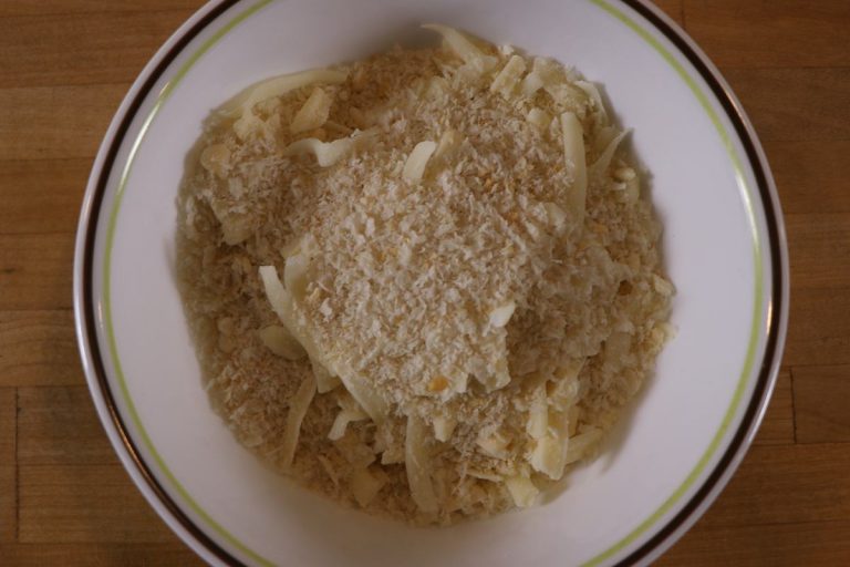 Combine Panko with parmesan cheese