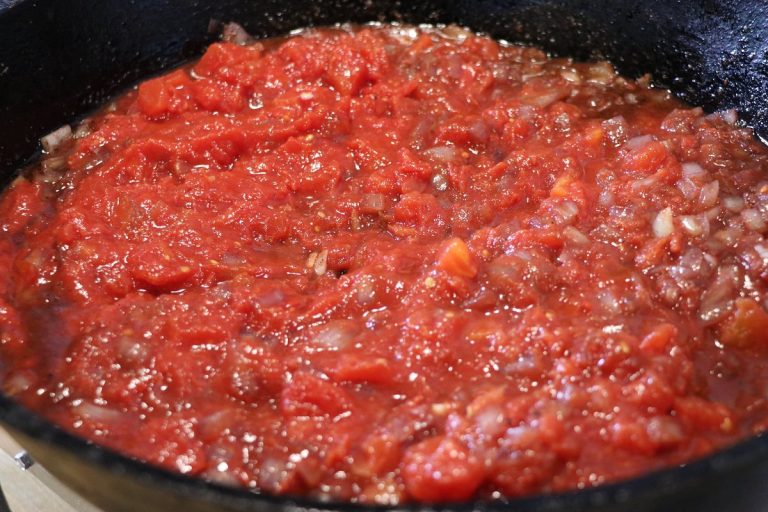 Add tomato, Mediterranean-ish and simmer