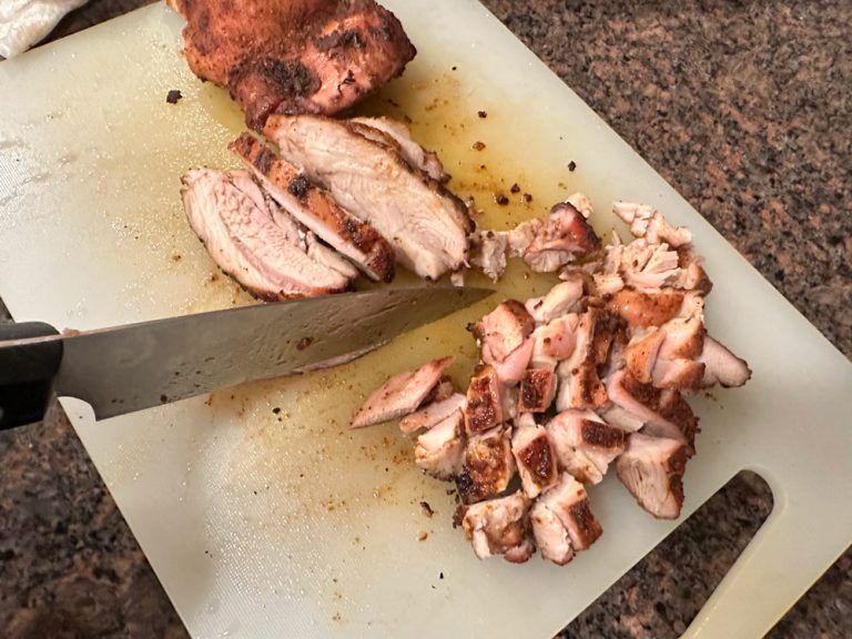 Dice chicken thighs into bite-size pieces