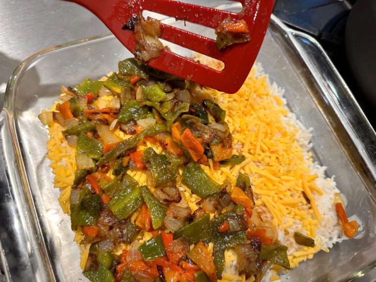 Layer of cheese and onions/pepper mixture