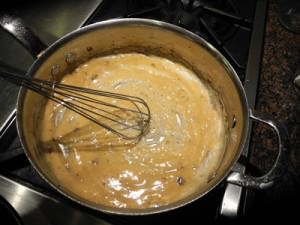 Melt butter then whisk in flour to make roux