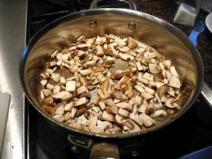 Add mushrooms to pan