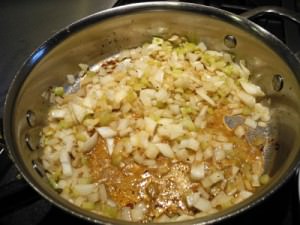 Cook onions, celery until soft while scraping brown bits from the pan