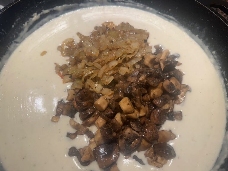 Add all cooked and reserved ingredients back into the pan