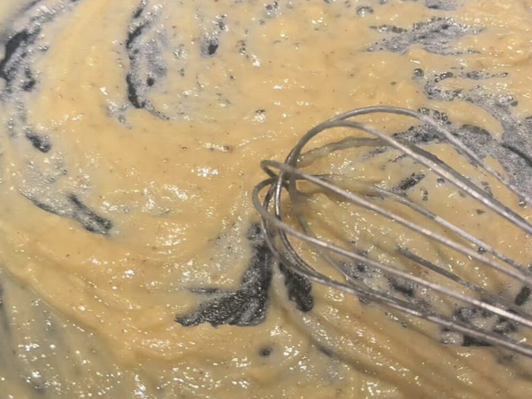Whisk in flour until lightly browned and well incorporated