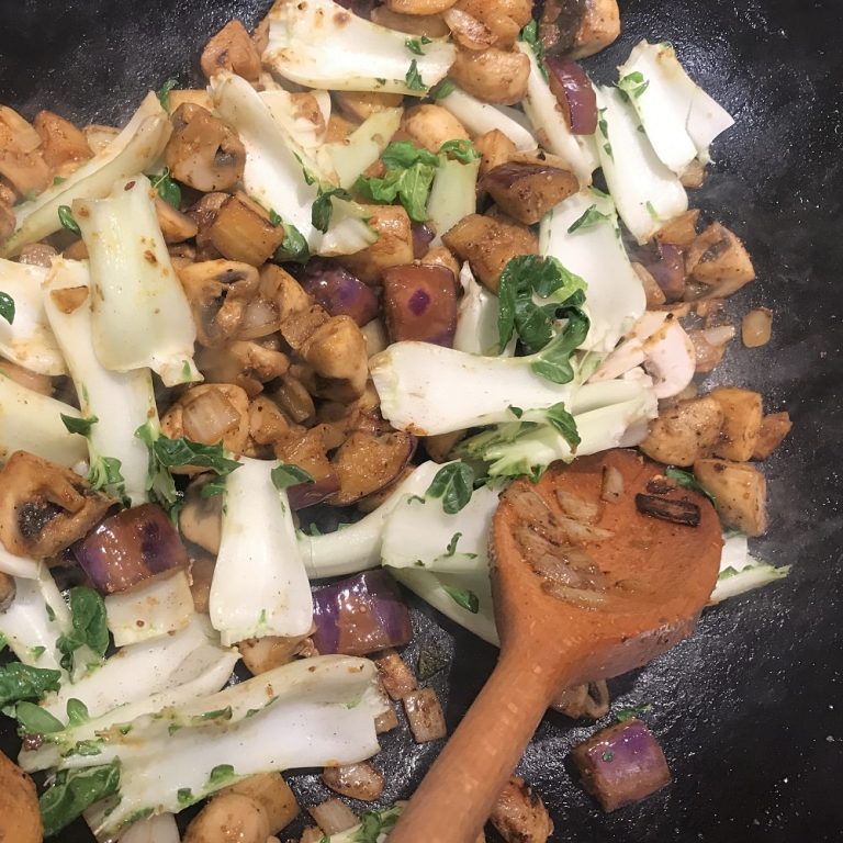 Add bok choy stems and toss 1-2 minutes