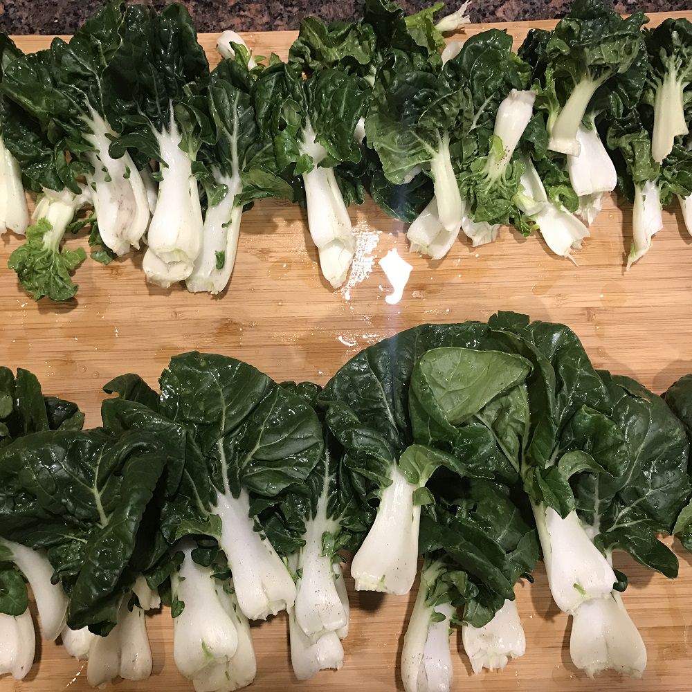 Separate boy choy stalks and wash thoroughly