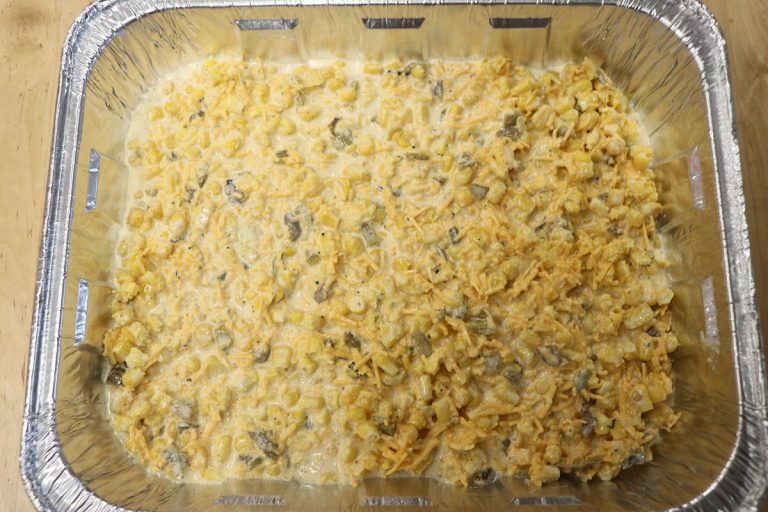 Pour into greased pan and spread into even layer