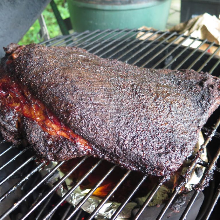 Cook for approximately 8-10 hours until brisket has formed a dark flavor crust, and is approximately 165-175°F internal temperature
