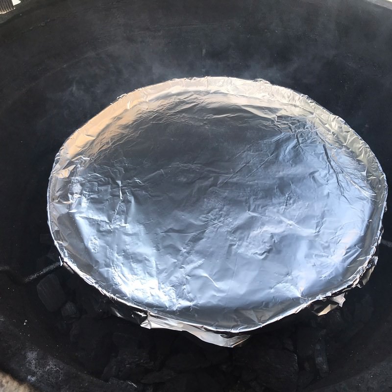 Place drip pan or other indirect barrier in place, stabilize at 250°F (or desired temperature) and wait until smoke smells clean and delicious