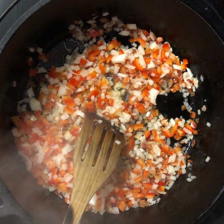 Stir in onion and bell pepper