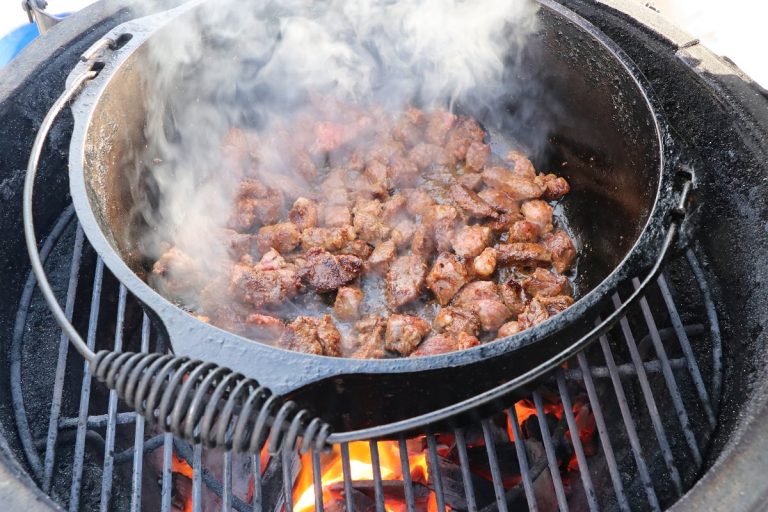 Brown beef in dutch oven over high heat