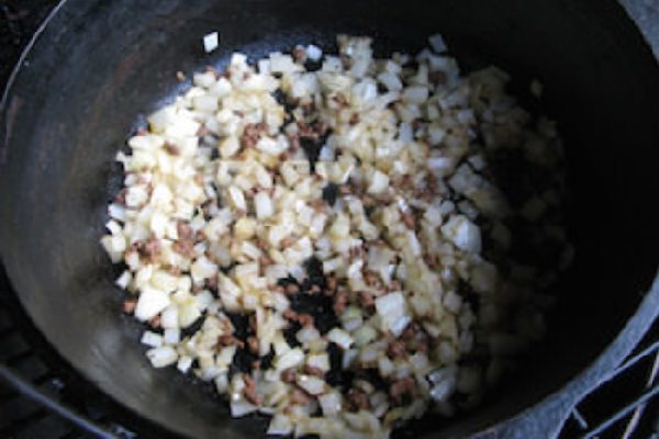 Sauté onion, a little salt, and scrape the browned bits from the pan