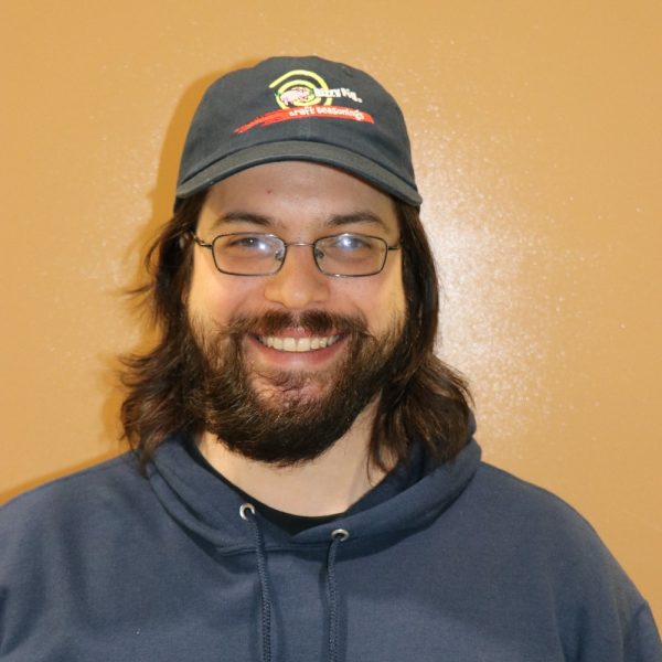 Rodrigo wearing Dizzy Pig Craft Seasonings hat in navy