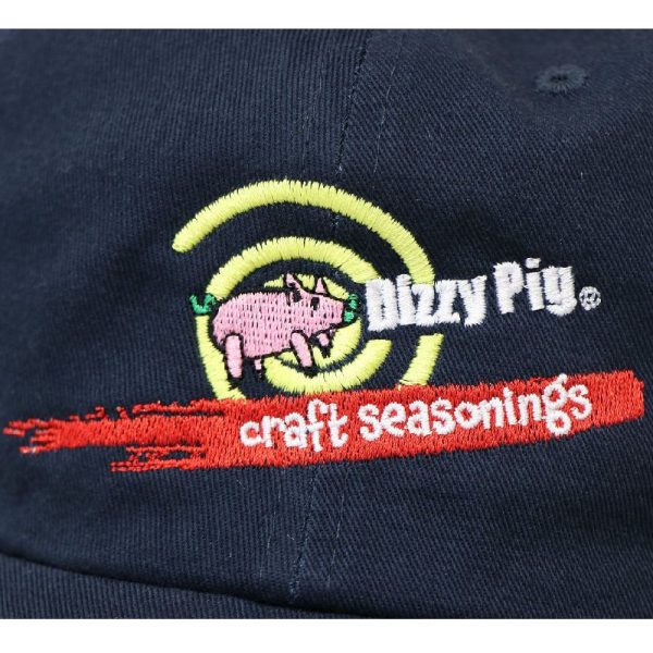 Close-up of embroidered Dizzy PIg Craft Seasonings logo