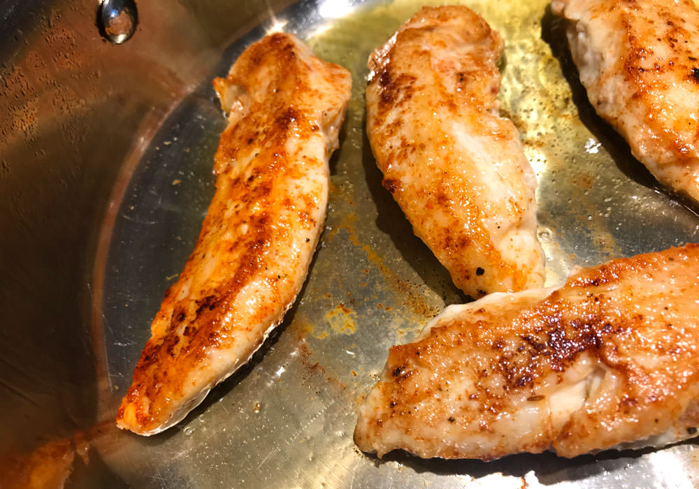 Brown chicken pieces on both sides, approximately 1-2 minutes per side