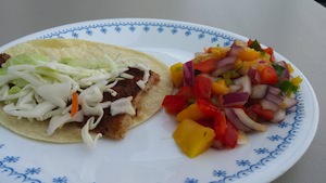Fish tacos with a side of mango salsa
