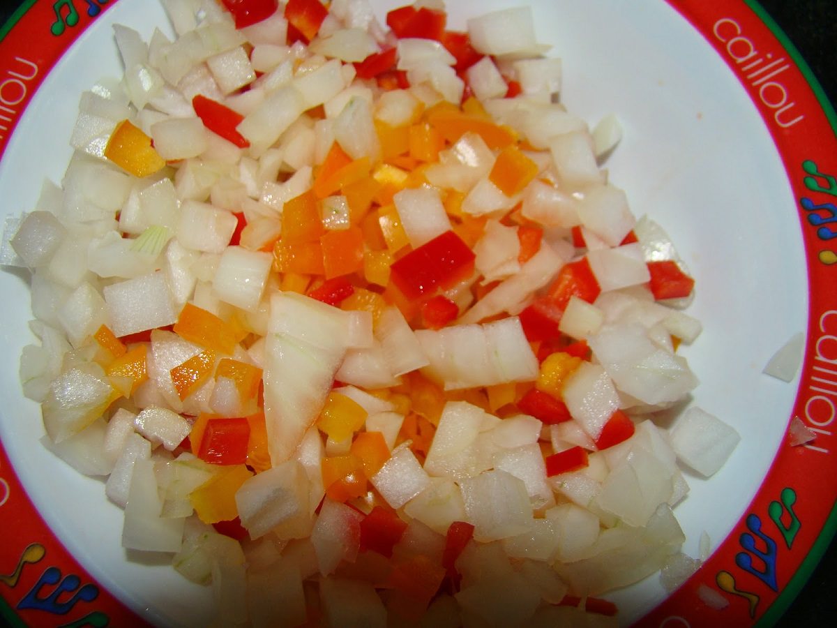 Chop onions. Try to make all onion and pepper pieces the same size