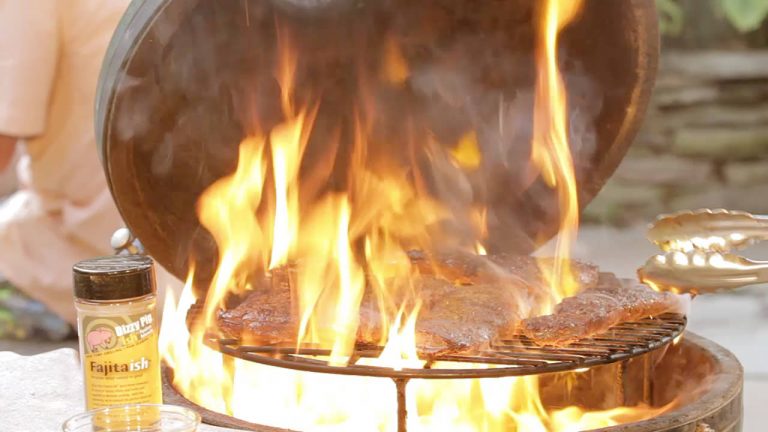 Grill seasoned steak over a very hot fire until charred on each side