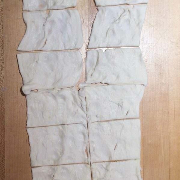 Cut crescent dough into 12 squares