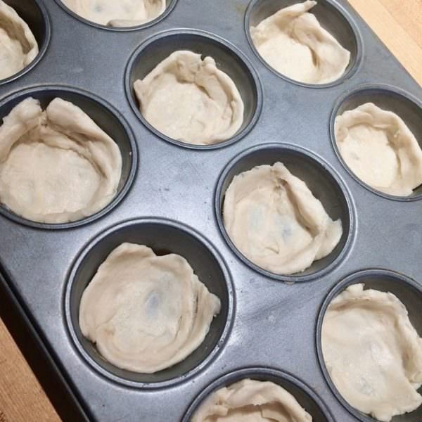 Press squares into muffin cups