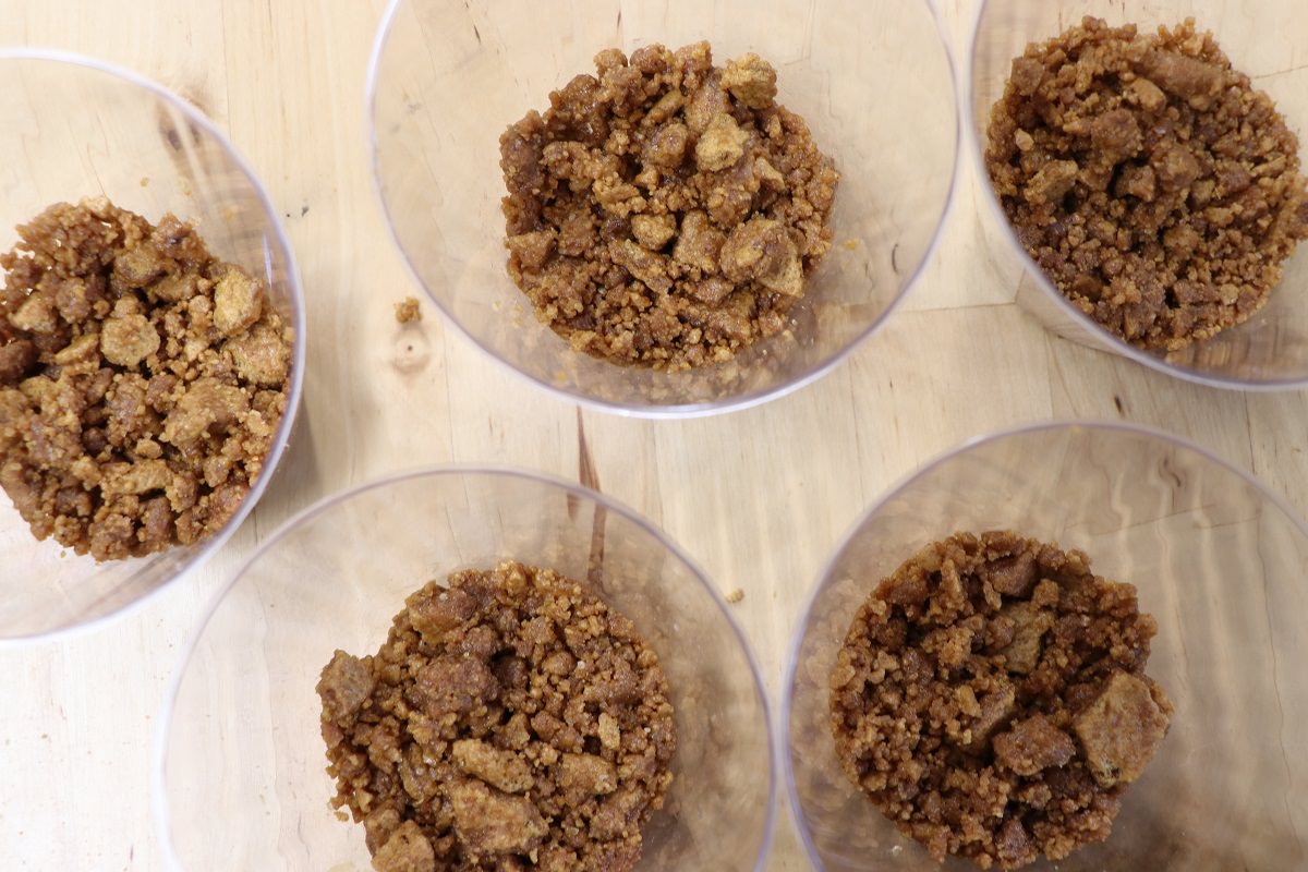 Start with a layer of ginger snap crumble on the bottom