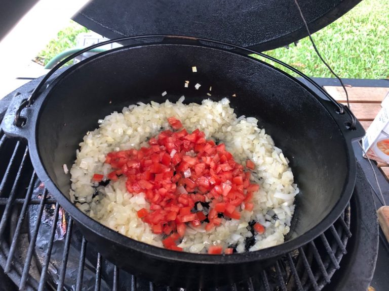 Saute the onion, garlic and diced tomatoes