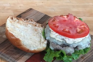 Grilled hamburgers with caramelized onion aioli