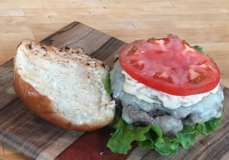 Grilled hamburgers with caramelized onion aioli