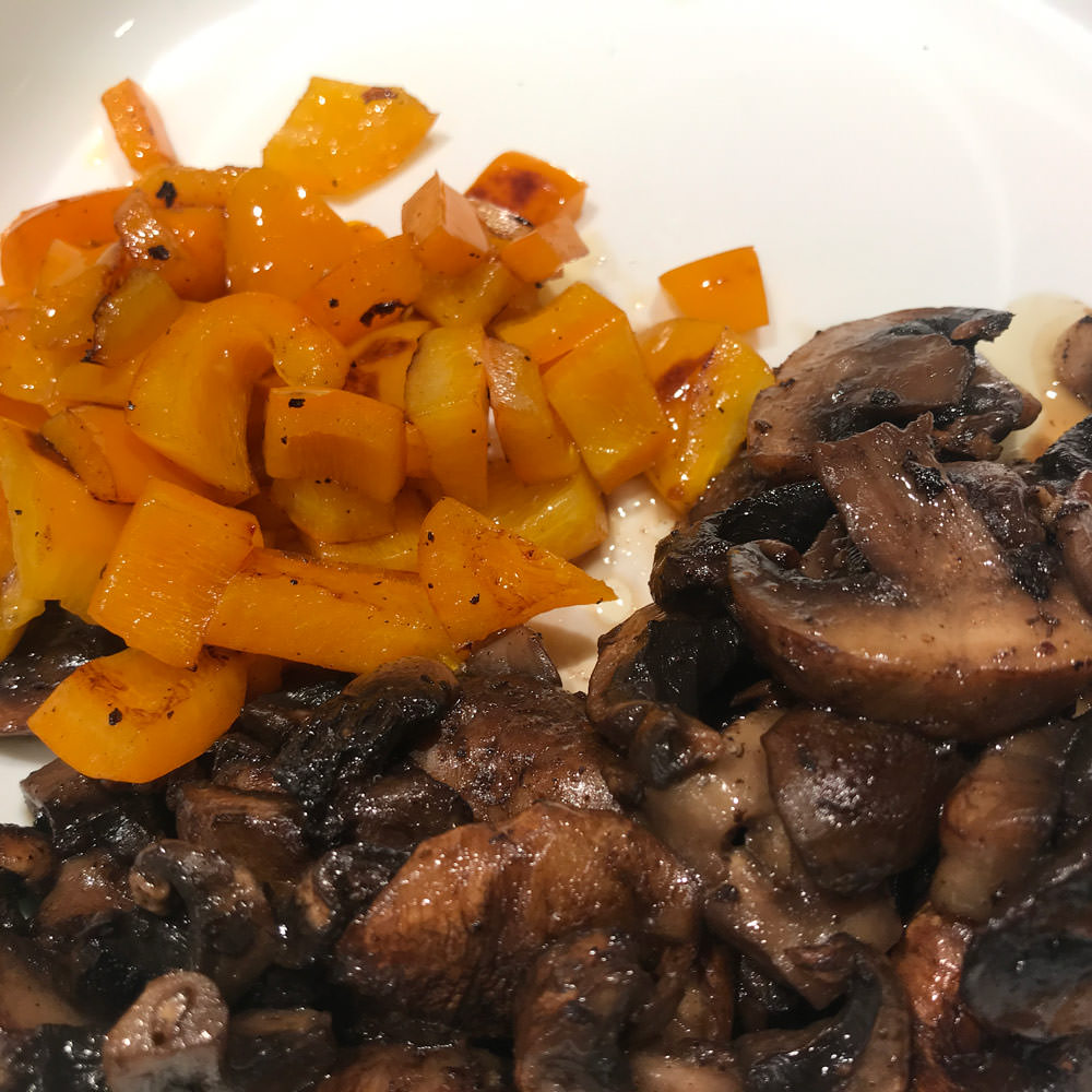 Browned mushrooms and peppers