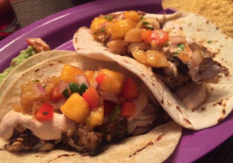 Grilled pineapple and mango salsa on blackened mahi-mahi tacos