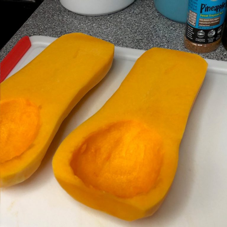 Clean seeds and membrane from butternut squash