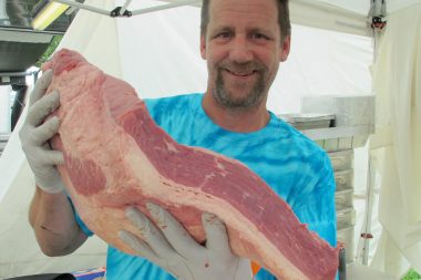 Chris and a big slab of brisket