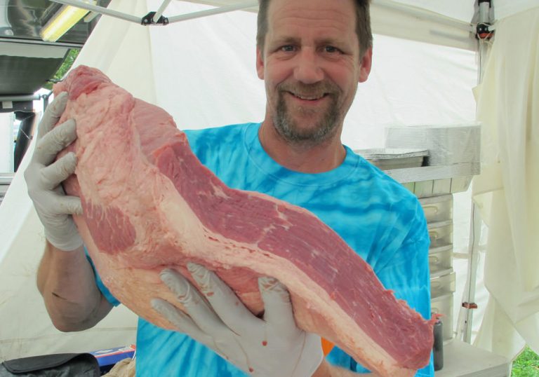 Chris and a big slab of brisket