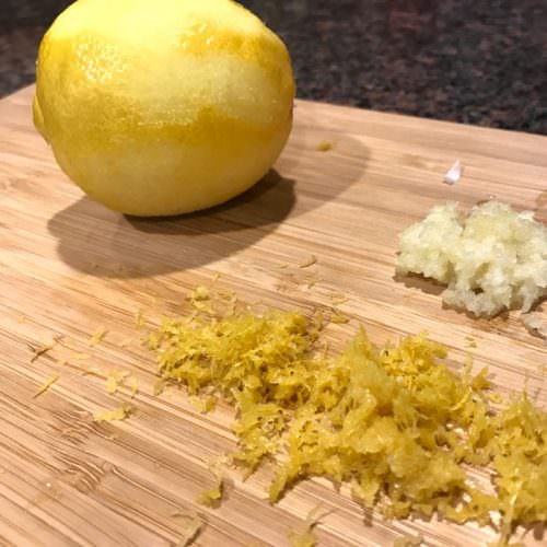 Zest lemon and mince garlic