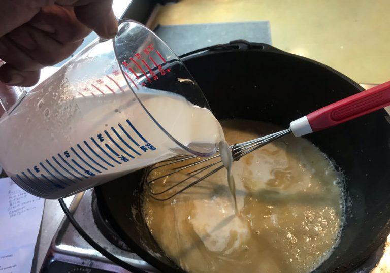 Slowly add the beer/half-and-half mixture while whisking