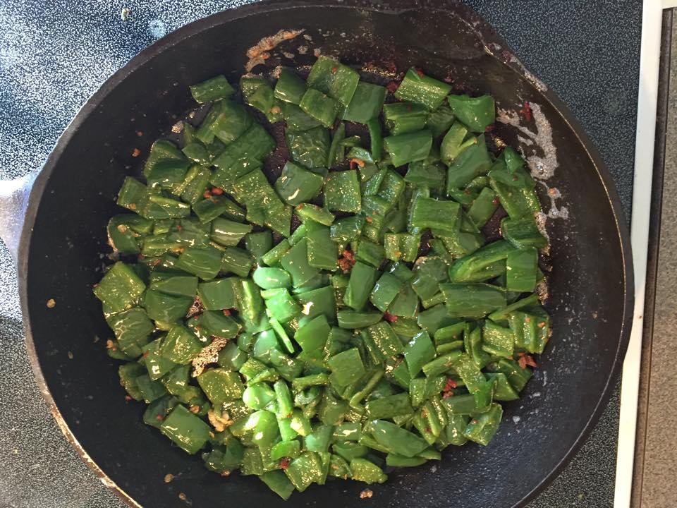 Spread peppers in even layer