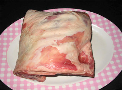 This is called a ‘square cut’ lamb shoulder roast.