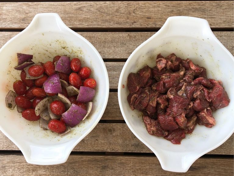 Marinate lamb cubes, tomatoes and onions